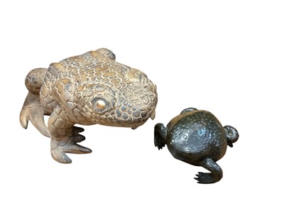 Lot 621 - Small bronzed metal toad ornament (possibly Japanese) together with a larger carved wood toad (2).