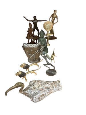 Lot 627 - Group of African metal sculptures of a hunter and lions and other metal sculptures.