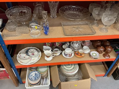 Lot 667 - Three shelves of assorted ceramics, glassware and teaware.