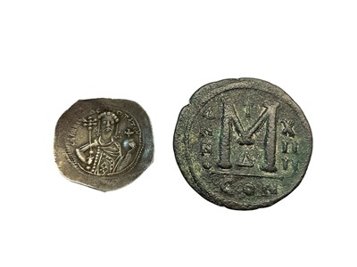 Lot 412 - Ancients - Byzantine coins to include Alexius I 1081-92 AD pre reform coinage silver Stamenon Nomisma (Scyphate) Obv: Christ enthroned in field to left IC; to right XC, Rev: Bust facing, wearing...