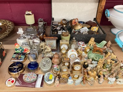 Lot 692 - Collection of Wade Whimseys, table lighters, clocks and various sundries.