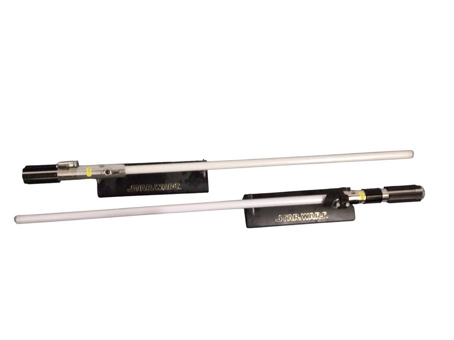 Lot 45 - Master Replicas Star Wars Lightsabers, with stands (2)