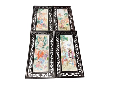 Lot 738 - Set of four contemporary Chinese porcelain plaques mounted in hardwood frames, each plaque 58.5 x 20.5cm.