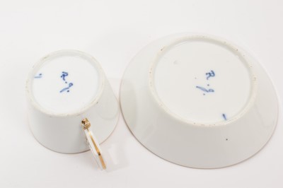 Lot 118 - Group of continental porcelain, including a Tournai plate, circa 1780, with moulded edge, painted in underglaze blue with flowers in the oriental style, together with a German cup and saucer pai...
