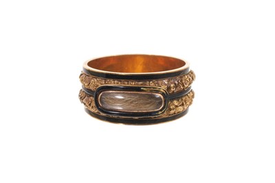 Lot George III gold and enamel mourning ring, the wide band with glazed compartment of hair on a double row of foliate gold bands with black enamel borders, inscribed "James Hodgson ob. 23rd April 1...