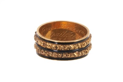 Lot George III gold and enamel mourning ring, the wide band with glazed compartment of hair on a double row of foliate gold bands with black enamel borders, inscribed "James Hodgson ob. 23rd April 1...