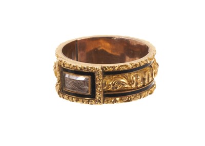 Lot George IV gold and black enamel mourning ring, the wide gold band with glazed hairwork plaque and foliate gold borders, inscribed "Sir Wm. Forbes Died. 24th Oct. 1828 Aged 56", ring size approxi...