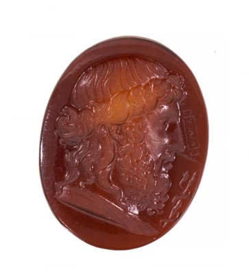 Lot Antique carved intaglio depicting a classical male bust in profile, signed, 24mm x 19mm.