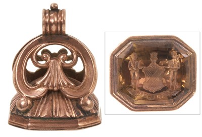 Lot Regency gold seal with a finely carved intaglio quartz armorial and motto 'Be Faithful', in a rose gold mount, 30mm.