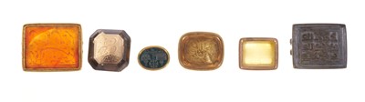 Lot 533 - A group of six antique seals, all with Eastern script, to include finely carved intaglio stones, some with gold mounts. (6)