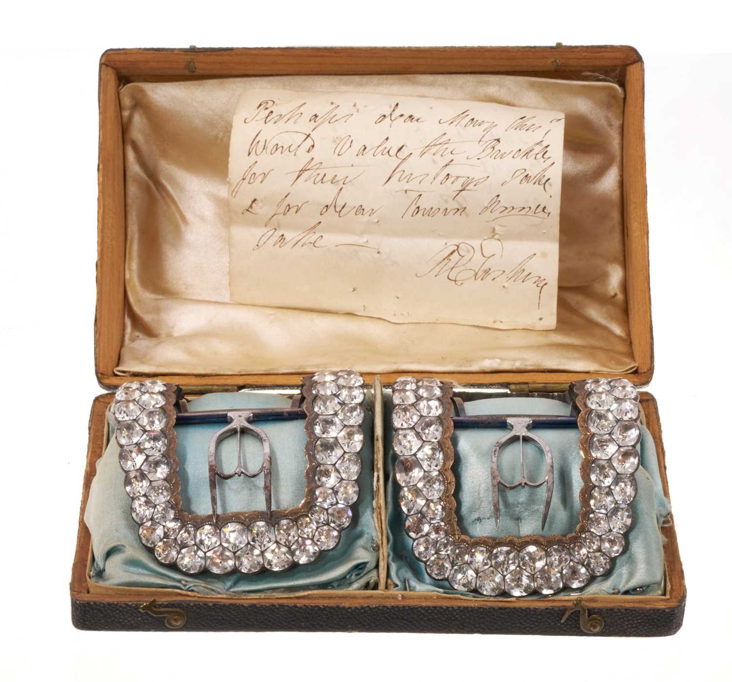 Lot A fine pair of large George III paste set shoe buckles with 'black dot' paste stones in white metal setting with polished steel fittings, in original fitted case with a hand written note; "Buck...