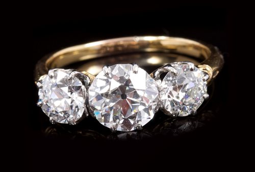 Lot 606 - Fine late Victorian diamond three stone ring...