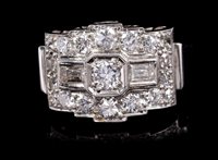 Lot 610 - Art Deco diamond cocktail ring of geometric...