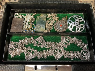 Lot 105 - Jewellery box containing a silver and blue enamel buckle, paste set brooches, white metal figural panel necklace, various gilt metal charms