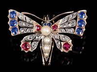 Lot 639 - Edwardian multi-gem set butterfly brooch, the...