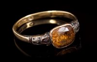 Lot 641 - Georgian dress ring with a foil-back orange...