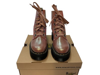 Lot 2071 - Two pairs of Dr Martens boots Smooth Pink and Iridescent Texture Pink. Plus a pair of Dr Martens Lilac sandals. All brand new, boxed and size 6.