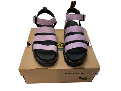 Lot 2071 - Two pairs of Dr Martens boots Smooth Pink and Iridescent Texture Pink. Plus a pair of Dr Martens Lilac sandals. All brand new, boxed and size 6.