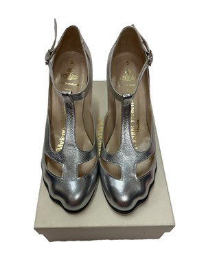 Lot 2073 - Vivienne Westwood T Bar silver shoes, boxed and soft pink dust bag. Size 5. Light wear.