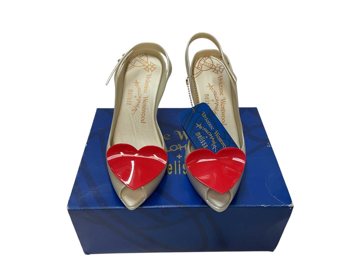 Lot 2074 - Three pairs of Vivienne Westwood + Mellissa Anglomania shoes, Beige Lady Dragon, Fuschia Wing , Black Mary Jane 111. All brand new, boxed and size Eur 39.