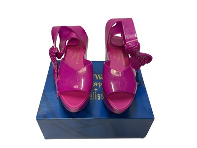 Lot 2074 - Three pairs of Vivienne Westwood + Mellissa Anglomania shoes, Beige Lady Dragon, Fuschia Wing , Black Mary Jane 111. All brand new, boxed and size Eur 39.