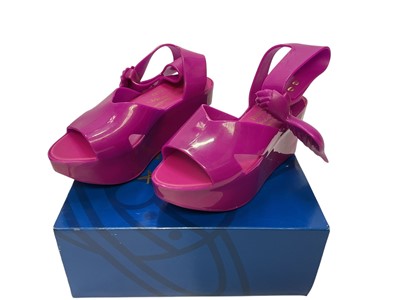 Lot 2074 - Three pairs of Vivienne Westwood + Mellissa Anglomania shoes, Beige Lady Dragon, Fuschia Wing , Black Mary Jane 111. All brand new, boxed and size Eur 39.