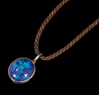 Lot 645 - Edwardian black opal pendant, the oval...