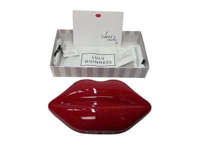 Lot 2084 - Lulu Guiness perspex red Lips Clutch bag. New with box, tags and soft dust bag.