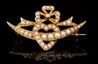 Lot 654 - Victorian seed pearl brooch with a heart and...