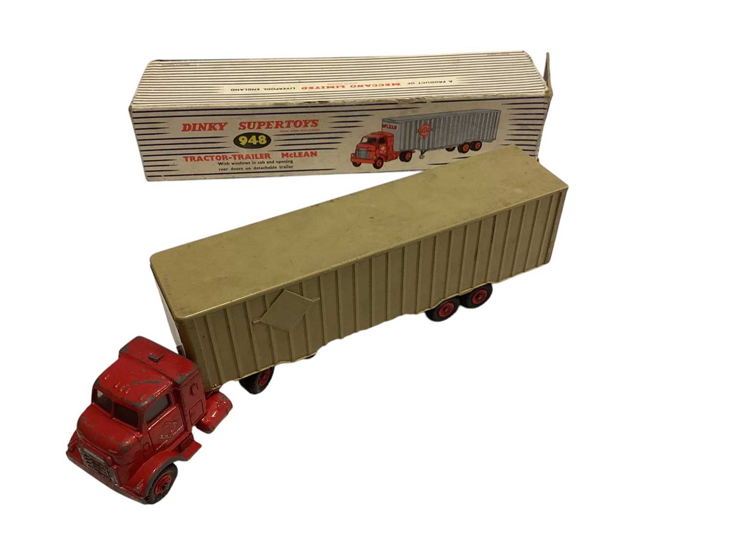 Lot 1876 - Dinky Supertoys diecast Mighty Antar Low Loader with propeller, No.986, Tractor-Trailer "McCleans", No.948 & Lorry Mounted Cement Mixer, No.960, all boxed (poor) (3)