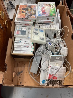Lot 1984 - Nintendo Wii with accessories and 11 games together with Nintendo 3DS in cosmo black with approximately 30 games