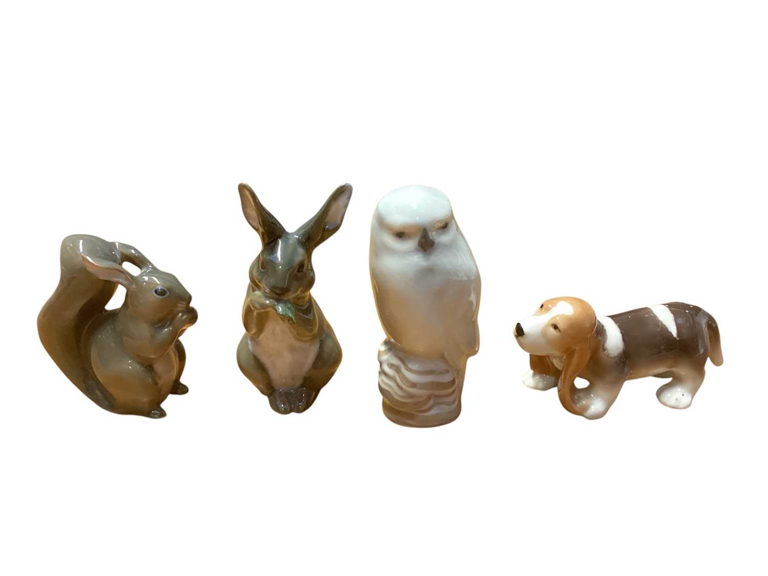 Lot 1207 - Four Royal Copenhagen animals together with a Royal Crown Derby paperweight and a dog (6)