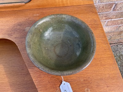 Lot 43 - Early Chinese celadon glazed bowl, with hardwood stand