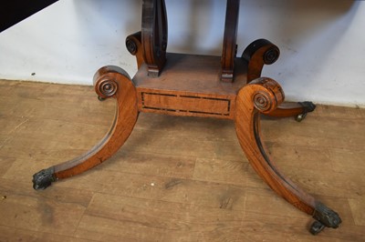 Lot 1537 - George IV mahogany and calamander sofa table with twin frieze drawers, on double lyre central supports and four splayed legs with brass capped castors, 152cm extended