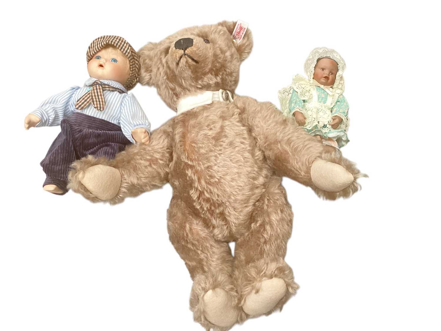 Lot 1980 - Steiff Teddy for UK 661372, Steiff small classic bear 040023, Steiff Macki, Original Peter figure with music barrow (working) and another Peter original figure. Plus two contemporary dolls ...