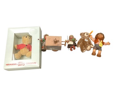 Lot 1980 - Steiff Teddy for UK 661372, Steiff small classic bear 040023, Steiff Macki, Original Peter figure with music barrow (working) and another Peter original figure. Plus two contemporary dolls ...