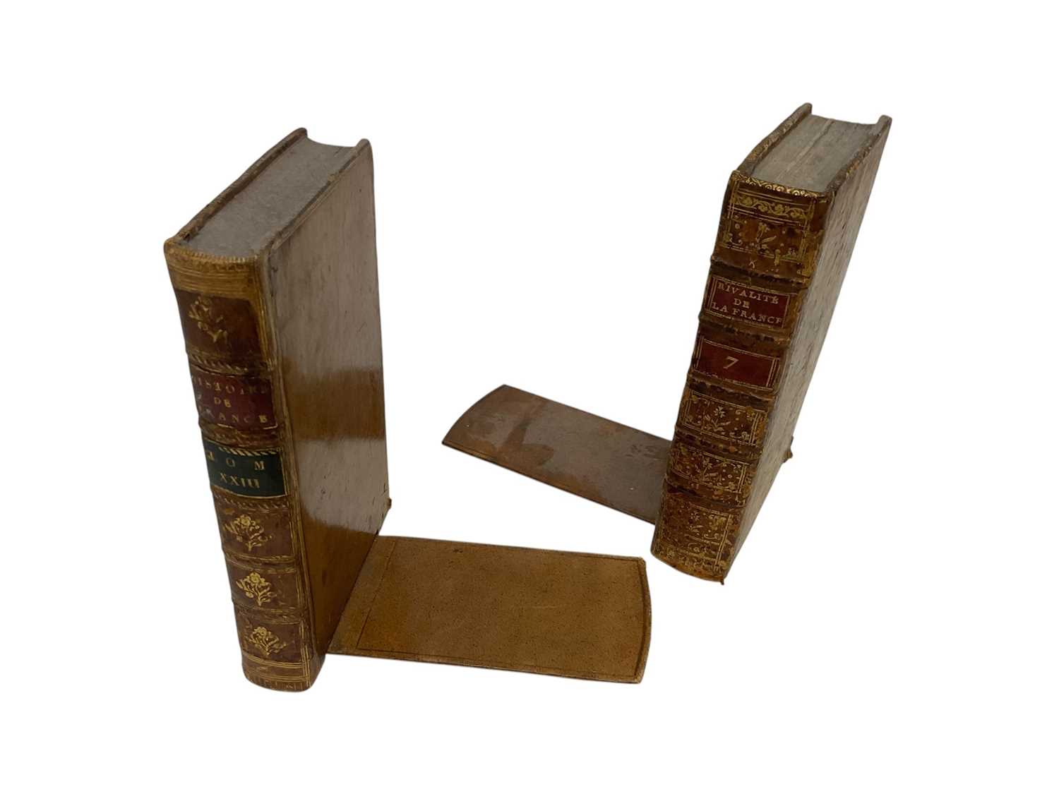 Lot 1663 - Novelty bookends, composed of antique bindings