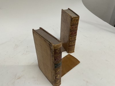 Lot 1663 - Novelty bookends, composed of antique bindings