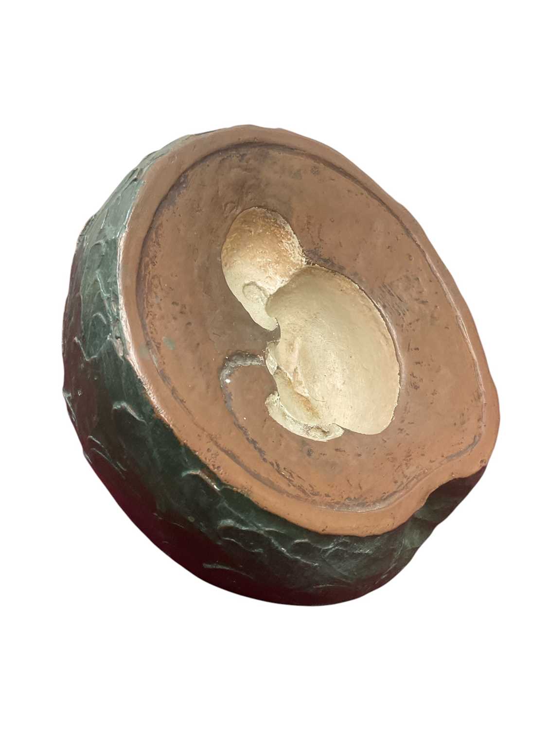 Lot 105 - Sculpture of an apple with child inside