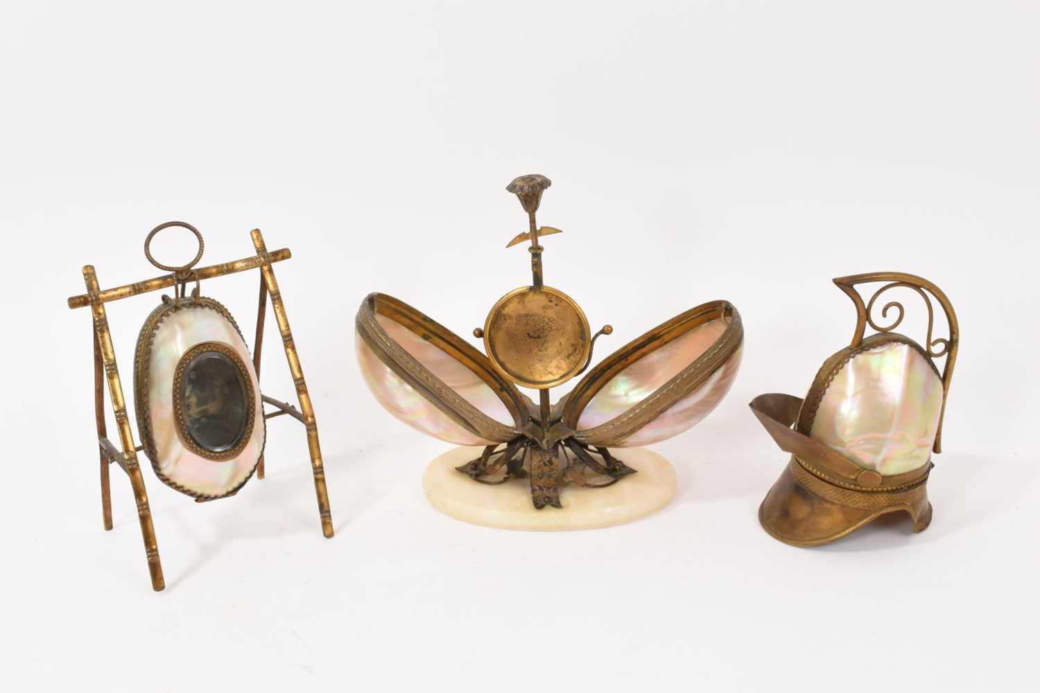 Lot 823 - Three 19th century novelty mother of pearl watch holders