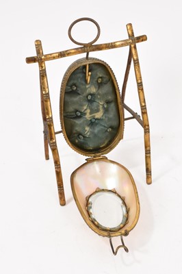 Lot 823 - Three 19th century novelty mother of pearl watch holders