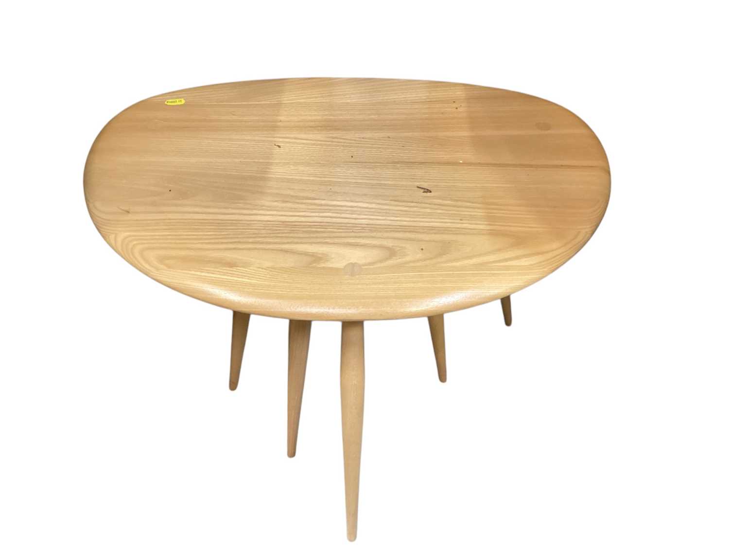 Lot 1384 - Nest of three vintage Ercol pebble tables