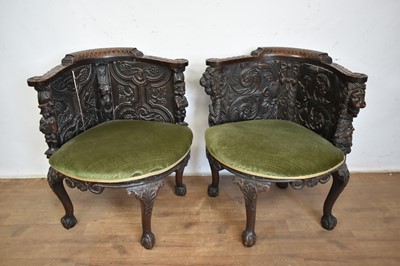 Lot 1312 - Unusual pair of Victorian carved oak tub chairs, utilising early, probably 17th century elements