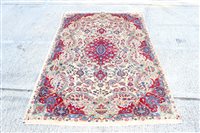 Lot 1762 - Meshed rug - the cream field centred by...