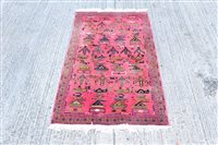 Lot 1765 - Unusual 1980s Afghan rug - with claret field...