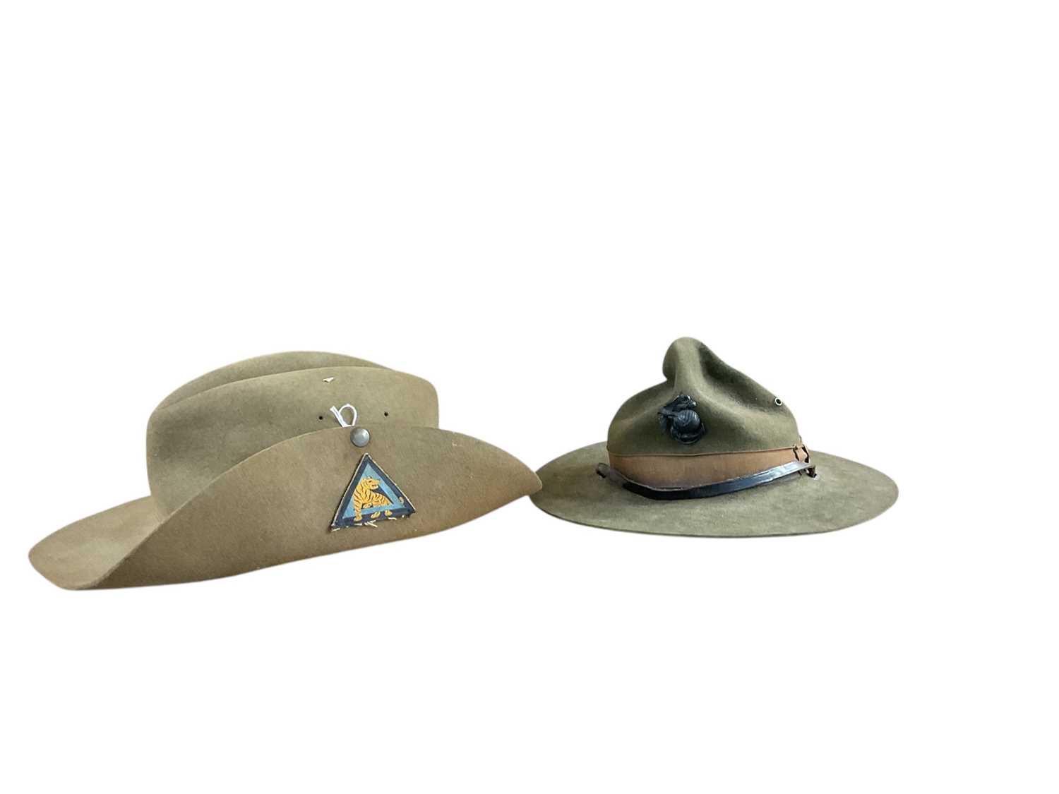 Lot 805 - Second World War Army Bush / Slouch Hat, with leather head band, stamped Walker Ashworth & LinneyLtd, dated 1943 and marked with broad arrow, together with an American example (2).