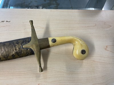 Lot 891 - Old African sword, similar spear, reproduction Indian cavalry sword and another Indian sword (4).