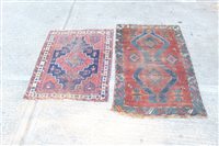 Lot 1769 - Persian rug - navy ground with stepped central...