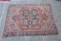 Lot 1770 - Good Heriz carpet - brick-red field with...