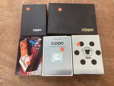 Lot 2591 - Group of six Zippo lighters including Rolling Stones World Tour, Marlboro, Stars of Hollywood and others in original boxes (6).